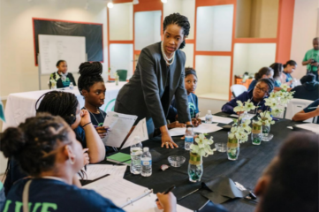 Teacher investing in youth during the summer